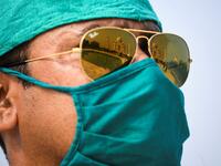 A soldier wearing a facemask as a preventive measure against the Covid-19 coronavirus stands guard at Taj Mahal in Agra on September 21, 2020. The Taj Mahal reopened to visitors on September 21 in a symbolic business-as-usual gesture even as India looks set to overtake the US as the global leader in coronavirus infections. Sajjad HUSSAIN / AFP