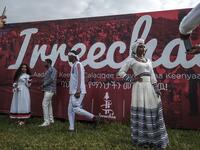 People in traditional clothing pose for pictures during the celebration of “Irreechaa”, the Oromo people thanksgiving holiday, in Addis Ababa, Ethiopia, on October 3, 2020.EDUARDO SOTERAS / AFP