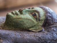 A picture taken on October 3, 2020 shows one of the sarcophaguses, excavated by the Egyptian archaeological mission which resulted in the discovery of a deep burial well with more than 59 human coffins closed for more than 2,500 years, displayed during a press conference at the Saqqara necropolis, 30 kms south of the Egyptian capital Cairo. They were unearthed south of Cairo in the sprawling burial ground of Saqqara, the necropolis of the ancient Egyptian capital of Memphis, a UNESCO World Heritage site. Th