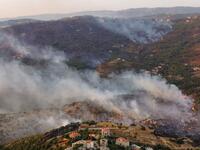 An aerial picture shows smoke billowing from a forest fire in Lebanon's Ras El Metn area, on October 10, 2020. AFP