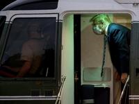 U.S. President Donald Trump talks to Marine One helicopter pilots while returning to the White House from Walter Reed National Military Medical Center on October 05, 2020 in Washington, DC. Trump spent three days hospitalized for coronavirus. Win McNamee/Getty Images/AFP WIN MCNAMEE / GETTY IMAGES NORTH AMERICA / Getty Images via AFP
