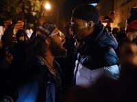 A US President Donald Trump supporter (L) clashes with a demonstrator at Black Lives Matter plaza across from the White House on election day in Washington, DC on November 3, 2020. Olivier DOULIERY / AFP