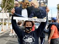 people have begun to congregate in cities across America after news outlets announced Joe Biden had reached the number of electoral votes needed to win the election. Kevin Winter/Getty Images/AFP