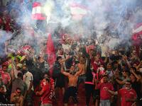 Grieving fans let off flares at the Argentinos Juniors stadium where Maradona began his professional career in the 1970s. (AFP/File)