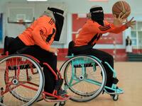 Disabled Yemeni women take part in a local wheelchair basketball championship in Yemen's capital Sanaa on December 8, 2020. In conflict-ridden Yemen, nine teams, including five-all women groups, competed in a local championship for the disabled in the capital Sanaa, which has been under rebel control since 2014. The players are competing to be embraced by society for their strengths rather than be viewed as a burden during the time of war. Mohammed HUWAIS / AFP