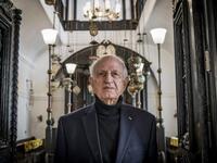 In this file photo taken on December 14, 2019, Andre Azoulay, adviser to the Moroccan king, poses for a picture at the "Bayt Dakira" (House of Memory) Jewish museum, in Morocco's Atlantic coastal city of Essaouira on December 14, 2019. Jewish history and culture in Morocco will now be part of the school curriculum -- a "first" in the region and in the North African country, where Islam is the state religion. Morocco's Jewish community has been present since antiquity and grew over the centuries, particularl