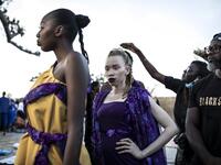 Fashion models wait backstage before heading out onto the runway during Dakar Fashion Week in Dakar on December 12, 2020. JOHN WESSELS / AFP