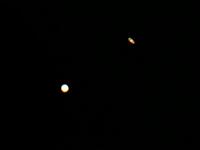 A picture taken on December 21, 2020, in al-Salmi district, a desert area 120 kms west of Kuwait City, shows the great conjunction of Jupiter and Saturn. The great conjunction refers to the alignment of Jupiter and Saturn. YASSER AL-ZAYYAT / AFP