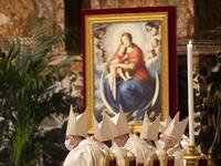Clergy, celebrates a new year Mass in St. Peter's Basilica at the Vatican on January 1, 2021. Alessandra Tarantino / POOL / AFP
