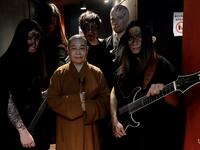 This picture taken on December 3, 2020 shows members of Taiwanese death metal band 'Dharma' posing for photographs during a rehearsal in Taipei. Sam Yeh / AFP