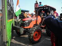 Farmers take part in a rally as they continue to protest against the central government's recent agricultural reforms, in New Delhi on January 26, 2021. Sajjad HUSSAIN / AFP
