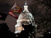 A Trump flag flies over the grounds of the U.S. Capitol on January 06, 2021 in Washington, DC. A pro-Trump mob stormed the Capitol earlier, breaking windows and clashing with police officers. Trump supporters gathered in the nation's capital to protest the ratification of President-elect Joe Biden's Electoral College victory over President Donald Trump in the 2020 election. John Moore/Getty Images/AFP