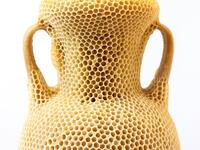 The Honeycomb Amphora I / 2020 “made by bees” series Materials: natural beeswax, museum glass, wood, re-used beehives (Instagram)