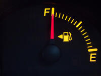 3. The arrow next to the petrol tank icon 
