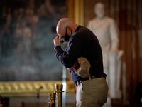 Capitol Police Officers pay their respects to late US Capitol Police officer Brian Sicknick as he lies in honor in the US Capitol Rotunda in Washington, DC February 2, 2021. Erin Schaff / POOL / AFP