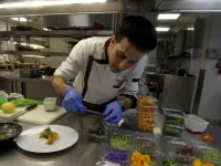 Tunisian chef Bassem Bizid uses edible flowers to prepare his dishes at a luxury hotel in Gammarth, an upscale northern suburb of the capital Tunis, on February 5, 2021. FETHI BELAID / AFP