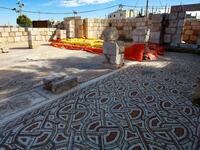 This picture shows the mosaic flooring of the Saint Mary church, built in 543 AD, the restoration of which was recently completed by workers employed by a pilot project run by the UN cultural agency UNESCO, in the small town of Rihab, some 70 kilometres north of the Jordanian capital Amman, on February 9, 2021. In the ruins of the ancient Byzantine church in Jordan, local townspeople and Syrian refugees work side by side on a project that unites preserving cultural heritage and fighting poverty.  Khalil MAZ