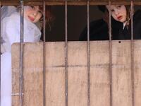 Israeli children dressed in costumes in celebration of the Jewish holiday of Purim are pictured in the ultra-Orthodox neighborhood of Bnei Brak, on February 26, 2021. Israel imposed a night-time curfew for three nights from yesterday evening to curb the spread of the coronavirus during the Jewish holiday of Purim, the government said. The curfew, from 8:30 pm to 5:00 am daily (1830 GMT to 0300 GMT), will be in force from Thursday night until Sunday morning, a joint statement from the prime minister's office