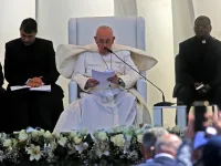 Pope Francis speaks during an interfaith service with many of Iraq's religious minorities 