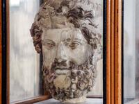  view of a Greek sculpture of the head of Zeus on display at the Cyrene Museum which houses Greco-Roman artefacts, in the eastern Libyan town of Shahat