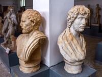 a view of busts from the Temple of Apollo on display at the Cyrene Museum which houses Greco-Roman artefacts