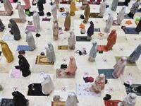 Muslim women offer prayers on the first night of Ramadan 