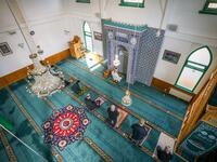 Muslims pray in the Turkish Mevlana Mosque in Hilversum