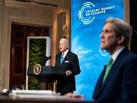 U.S. President Joe Biden delivers remarks as Special Presidential Envoy for Climate and former Secretary of State John Kerry listens during day 2 of the virtual Leaders Summit on Climate at the East Room of the White House April 23, 2021 in Washington, DC. Biden pledged to cut greenhouse gas emissions by half by 2030