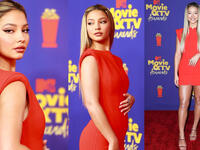  Madelyn Cline Hit the red carpet in a red Versace minidress with sculpted shoulders and Swarovski crystal encrusted sandals 