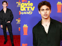 Tanner Buchanan kept it simple in an all-black Yves Saint Laurent look wearing a textured silky shirt and black skinny jeans.