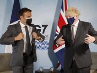 Britain's Prime Minister Boris Johnson and France's President Emmanuel Macron take part in a bilateral meeting during the G7 summit in Carbis bay