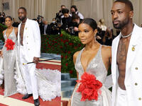 Gabrielle Union and Dwyane Wade dressed in custom Atelier Versace