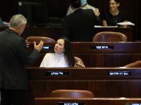 Members of the Israeli parliament Tali Gottlieb (R) for the Likud party and Meir Cohen for Yesh Atid, attend a parliament (Knesset) meeting in Jerusalem on June 28, 2023. (Photo by GIL COHEN-MAGEN / AFP Secrets and Scandal: Gottlieb's entry into Israel's most classified committee ignites political firestorm
