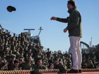 OCEANSIDE, CALIFORNIA - OCTOBER 18: U.S. Marines throw their covers on stage for U.S. Vice President JD Vance to sign as he arrives to speak at the United States Marine Corps 250th birthday celebration at Marine Corps Base Camp Pendleton on October 18, 2025 in Oceanside, California. The U.S. Marines are marking their 250th anniversary with a live amphibious assault demonstration entitled  (Photo by MARIO TAMA / GETTY IMAGES NORTH AMERICA / Getty Images via AFP) Pentagon turns to Trump’s secret benefactor to fund military salaries