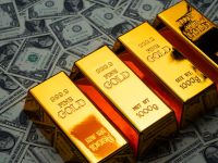 الذهب يستقر والفضة قرب مستوى قياسي