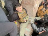 Jake Lang is seen attacked by rioters in Minneapolis