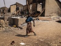 Gunmen kill 25 in twin village attacks in northeast Nigeria