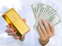 الأسواق تترقب.. الذهب يتراجع والدولار يواصل الصعود