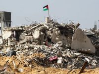 علم فلسطين فوق الركام