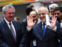 Iraq's Foreign Minister Ibrahim Al-Jaafari (R) and Luxembourg's Foreign Minister Jean Asselborn attend the Brussels conference on April 25, 2018.  Emmanuel Dunad/ AFP