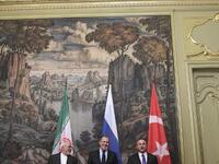 Russian Foreign Minister Sergei Lavrov (C), his Turkish counterpart Mevlut Cavusoglu (R) and Iran's Foreign Minister Mohammad Javad Zarif pose for pictures prior to their meeting in Moscow on April 28, 2018.  Alexander NEMENOV / AFP