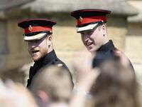 Britain's Prince Harry, Duke of Sussex (L) and Prince Harry's brother and best man Prince William, Duke of Cambridge arrive for the wedding ceremony of Britain's Prince Harry, Duke of Sussex and US actress Meghan Markle at St George's Chapel, Windsor Castle, in Windsor, on May 19, 2018. 
Chris Jackson/ AFP