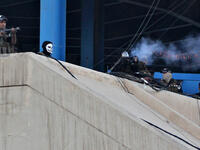 Iraqi security forces fire tear gas toward protesters during a demonstration against unemployment and a lack of basic services in the capital Baghdad's Tahrir Square on July 20, 2018. (AFP/ Ahmad Al Rubaye)
