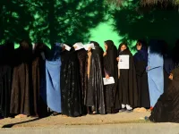 Afghan women wait in line to vote at a polling centre for the country's legislative election in Herat province on October 20, 2018.
HOSHANG HASHIMI / AFP