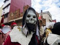 Young Moroccans take part in the Boujloud festival, a popular celebration also known as the 'Moroccan Halloween' in the Sidi Moussa district of Sale near Rabat, on October 27, 2018. 
FADEL SENNA / AFP