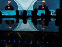 Turkish President Recep Tayyip Erdogan is displayed on a giant screen during the opening ceremony of Istanbul's new international airport, in the Arnavutkoy district, on the European side of Istanbul on October 29, 2018. 
BULENT KILIC / AFP