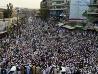 Supporters of Pakistan's religious hardline party Jamiat Ulema Islam (JUI) march during a protest rally following the Supreme Court's decision to acquit Pakistani Christian woman. (ABDUL MAJEED / AFP)