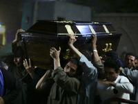 Egyptian relatives and friends of Christian Assad Labib, 35 year old, carry his casket during his funeral at the Anglican Church in Sawaada village near Minya city early on November 3, 2018. 
STR / AFP