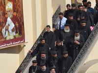 Coptic Christian priets leave the Prince Tadros church in Egypt's southern Minya province, following a morning ceremony for victims killed in an attack a day earlier, on November 3, 2018. 
MOHAMED EL-SHAHED / AFP