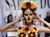 A model displays a chocolate dress at the 2018 chocolate fair fashion show in Beirut on November 8, 2018. 
JOSEPH EID / AFP